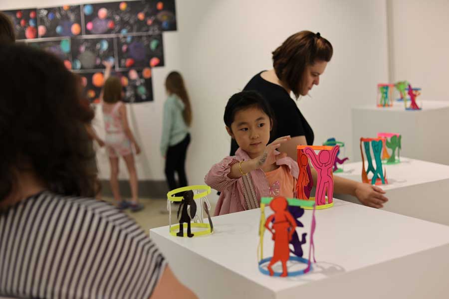 Youth painting at art camp
