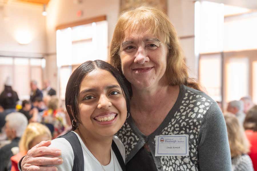 Student with a donor at the Scholarship Luncheon